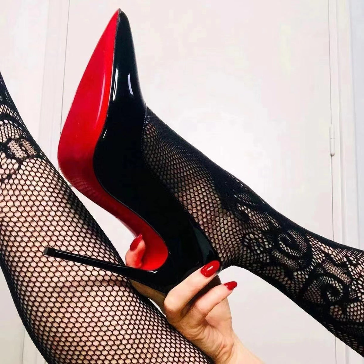 Black flirty red sole shoes DO311